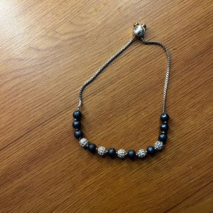Adjustable blue and silver bracelet